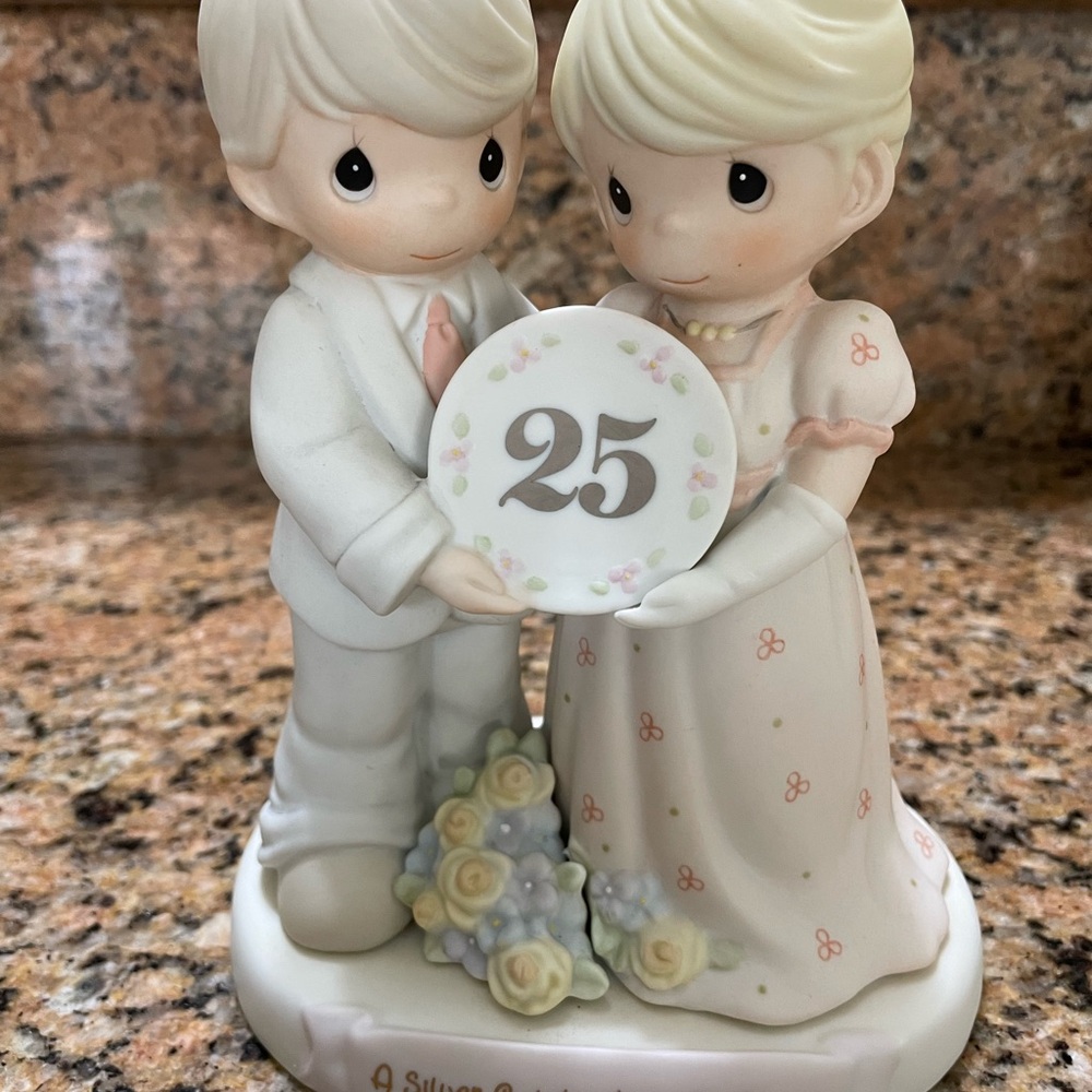 25th Anniversary Precious Moments Figurine